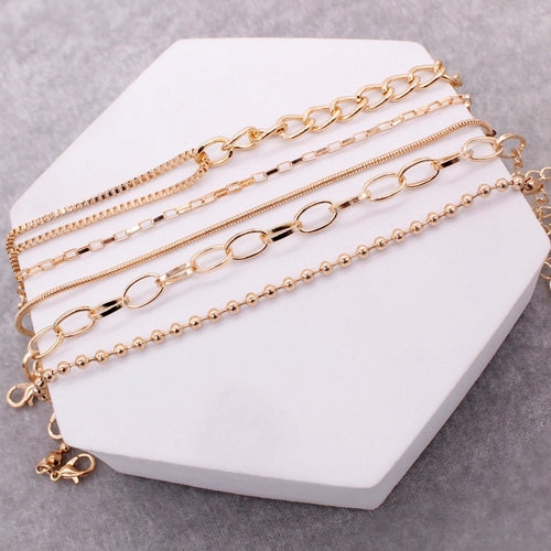 LAYERED BRACELET SET.