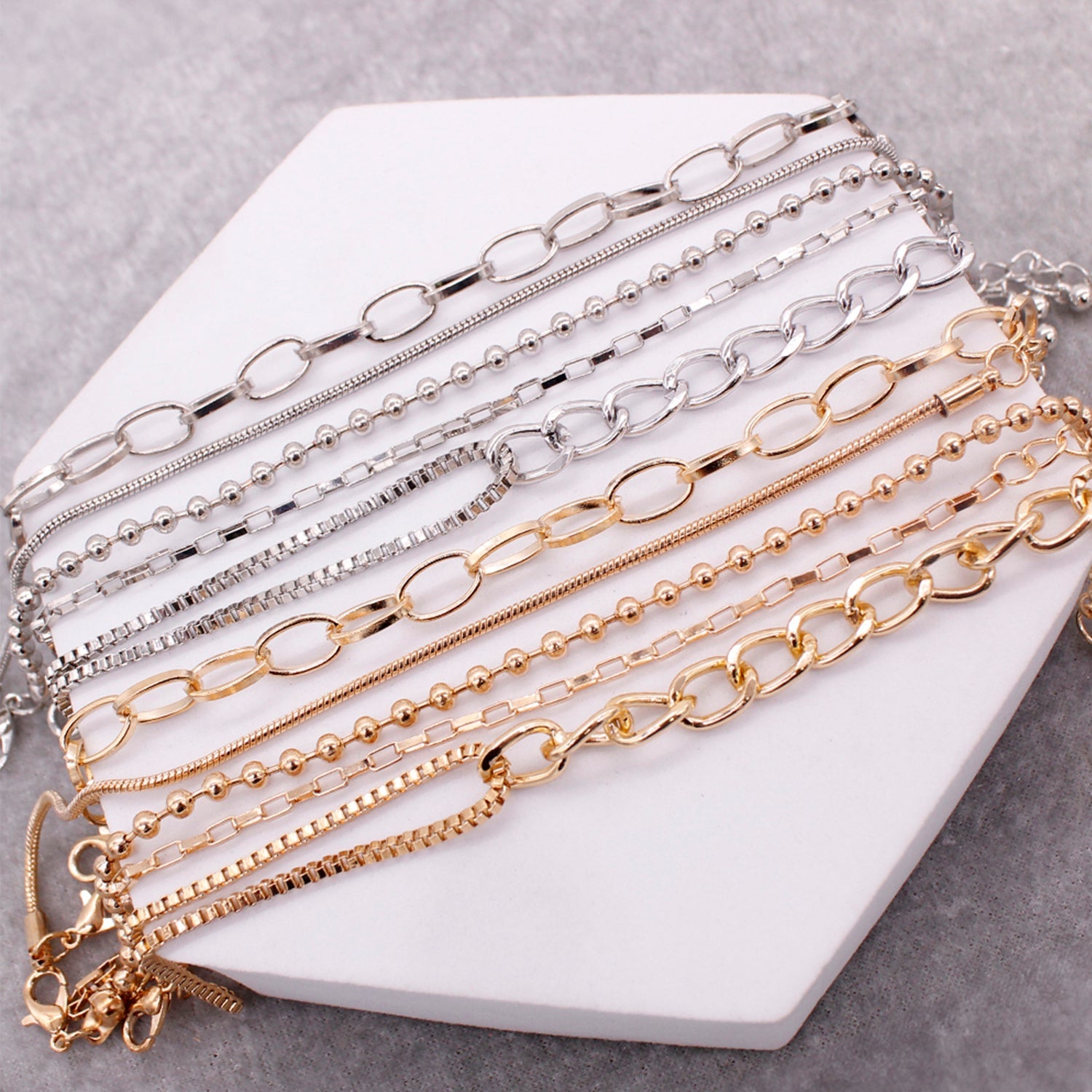 LAYERED BRACELET SET.