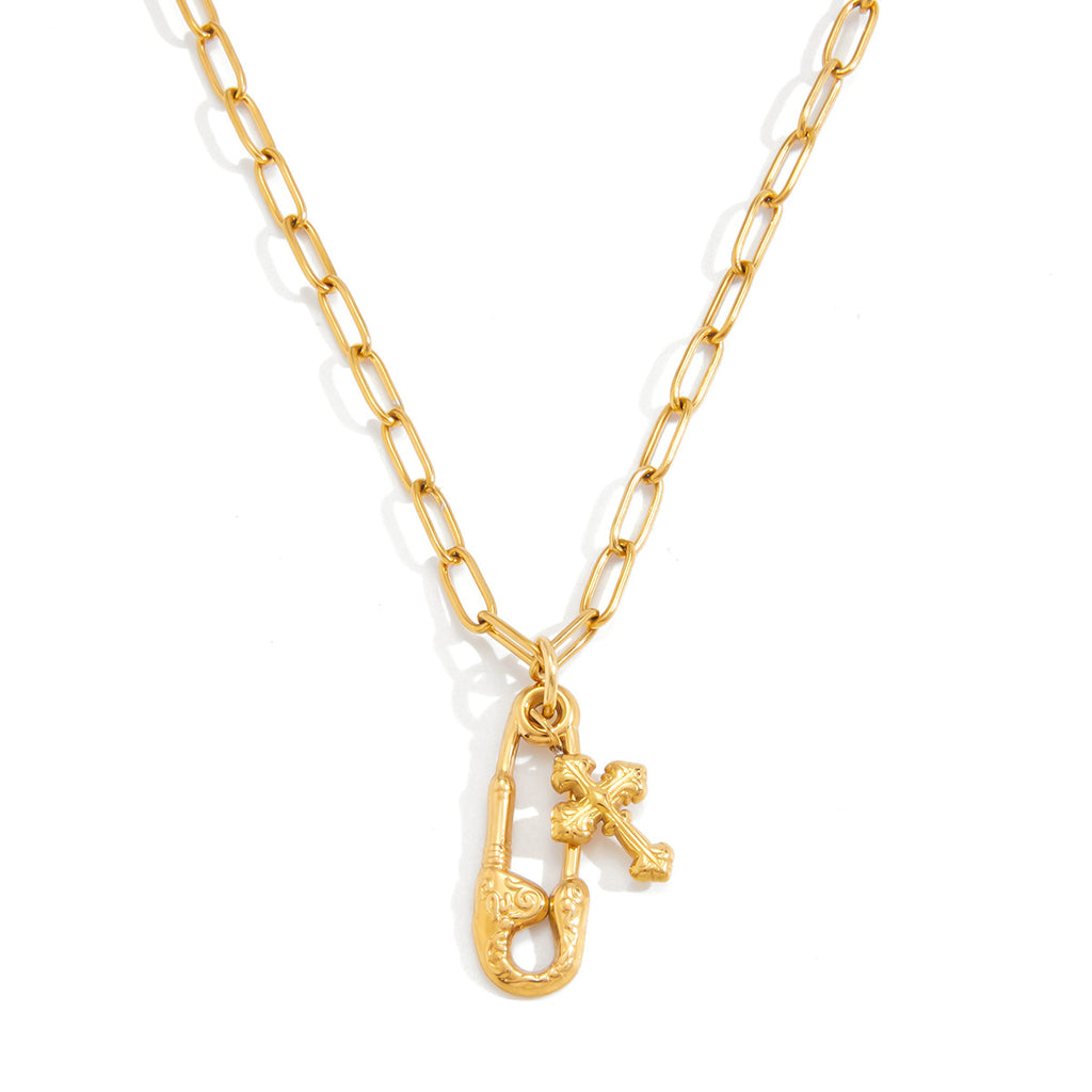 Alt text: Gold paperclip pendant necklace on link chain, polished stainless steel with gold-tone finish, MINIMAL