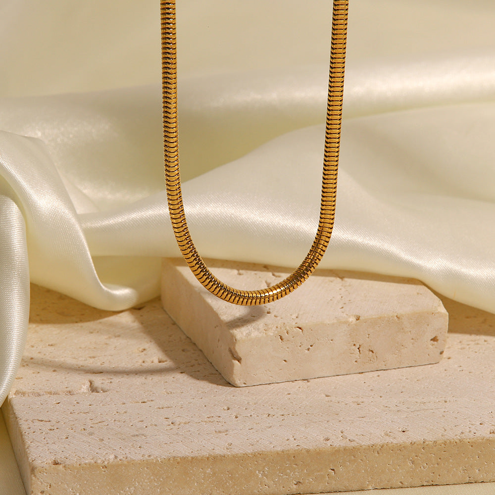 18K gold snake bone chain necklace, fluid interlocking chain design, 45cm, titanium steel with PVD gold plating, MINIMAL