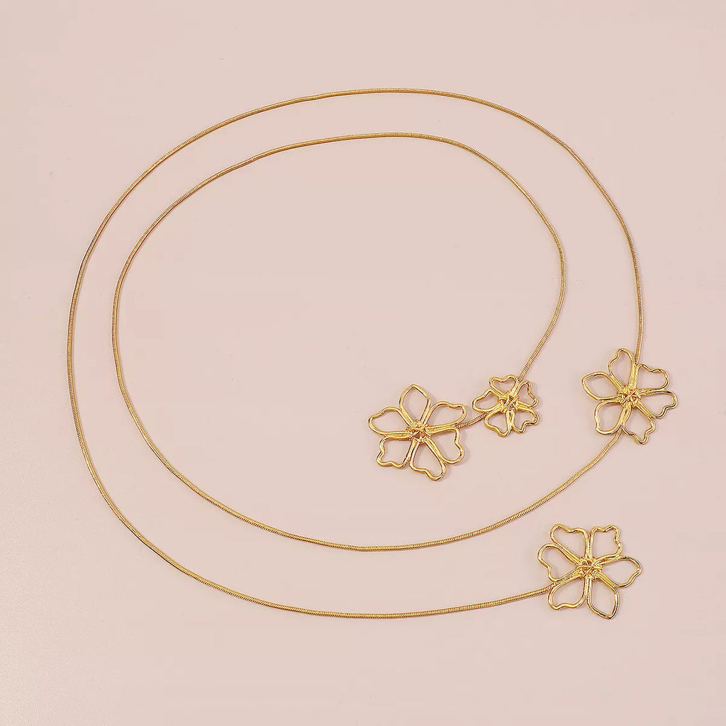 Alt text: 18K gold flower pendant necklace, floral design on long 65cm chain, gold-plated alloy, MINIMAL