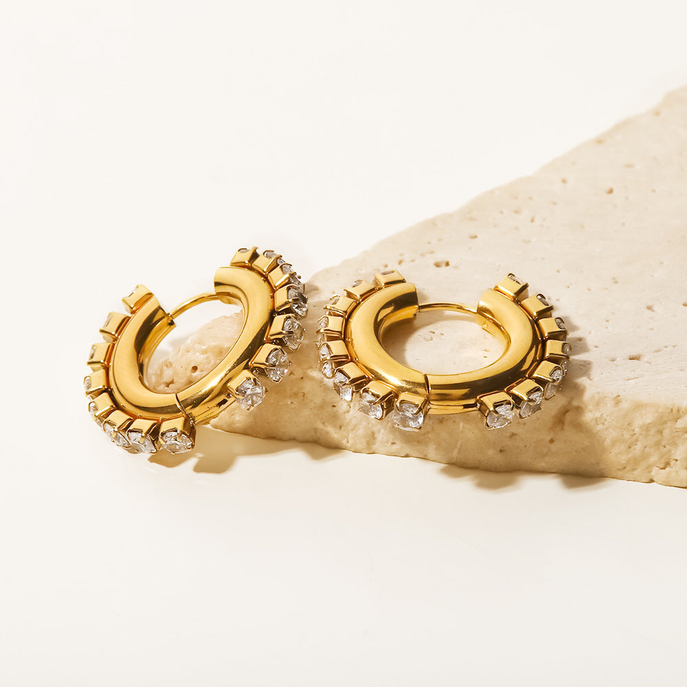 18K gold white zircon square earrings styled on ear, subtle light catch — MINIMAL