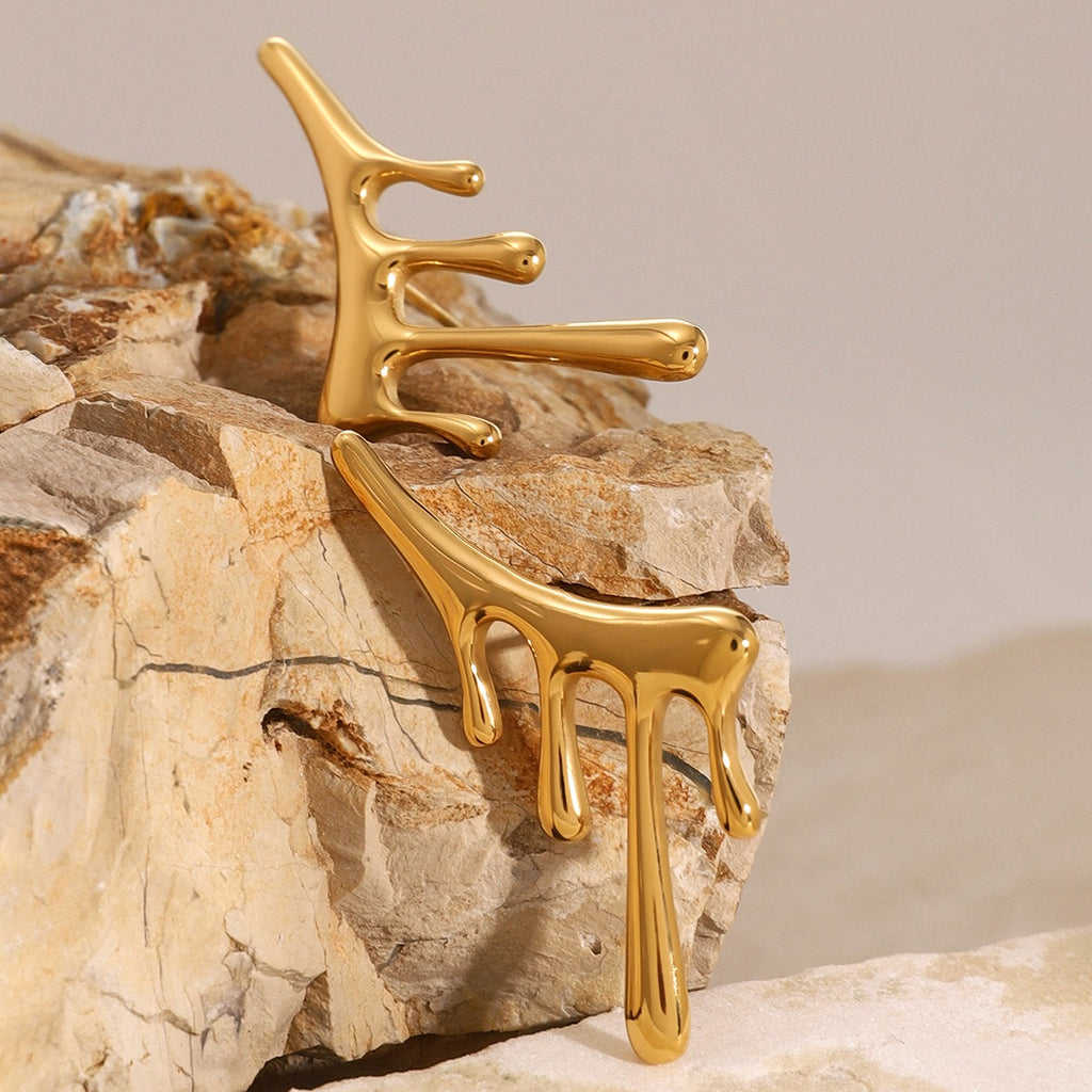 18K gold handcrafted drop earrings on ear, movement and light catch — MINIMAL