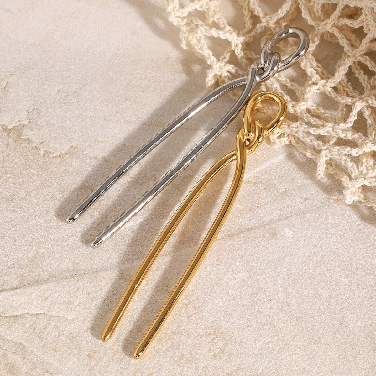 18K gold geometric knot hair pin detail view, titanium steel with PVD plating, MINIMAL