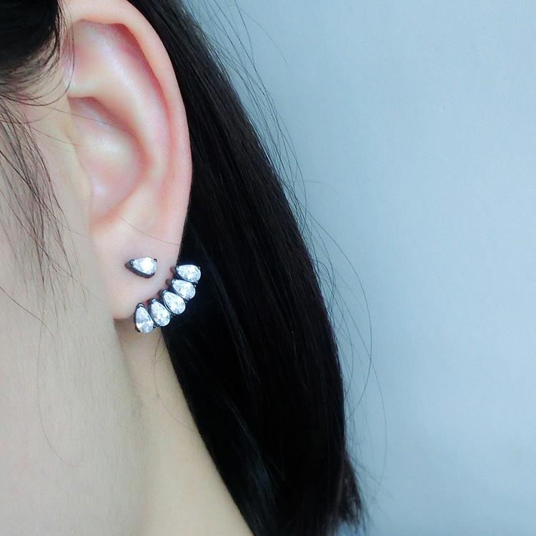 PAVÉ EAR JACKET EARRINGS.