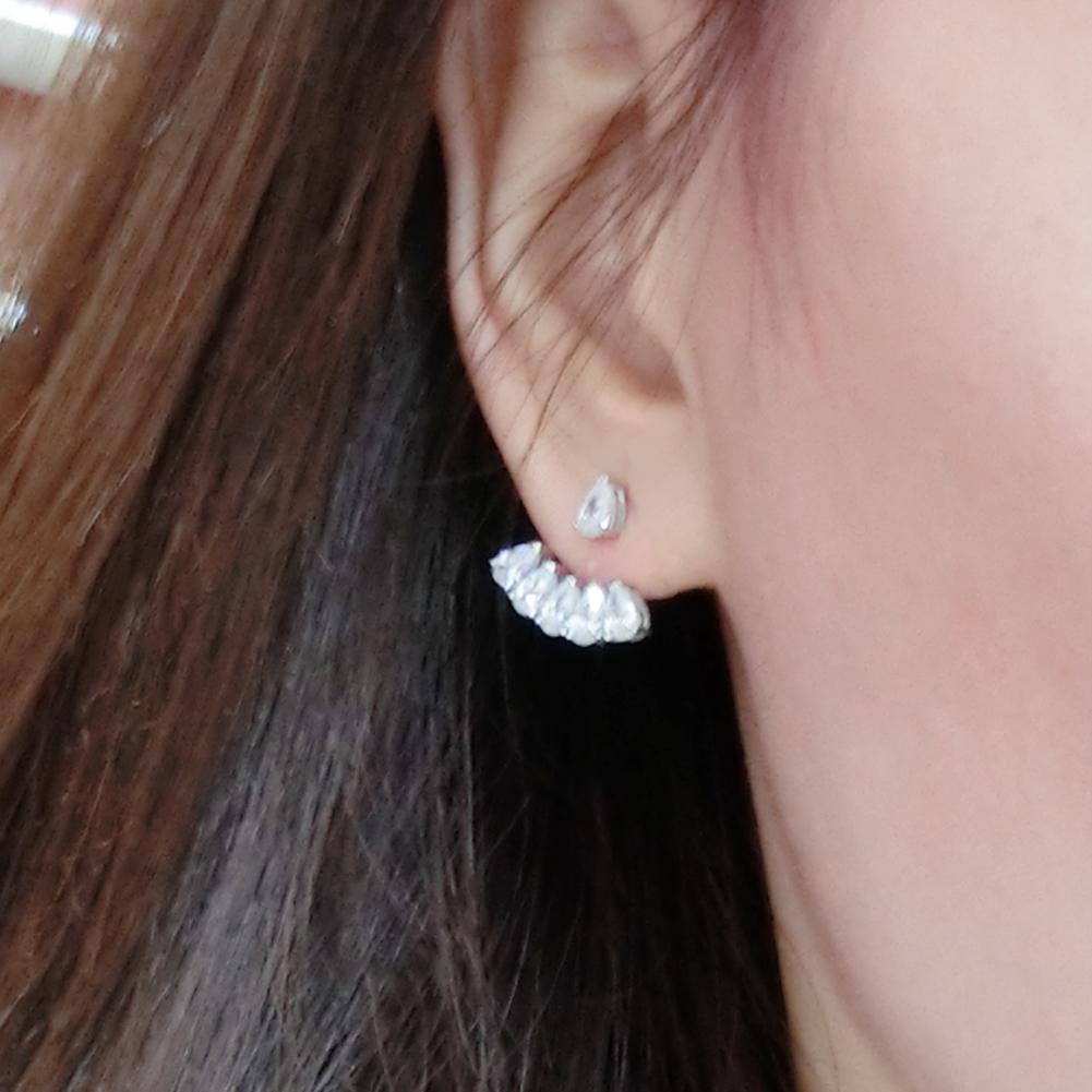 PAVÉ EAR JACKET EARRINGS.