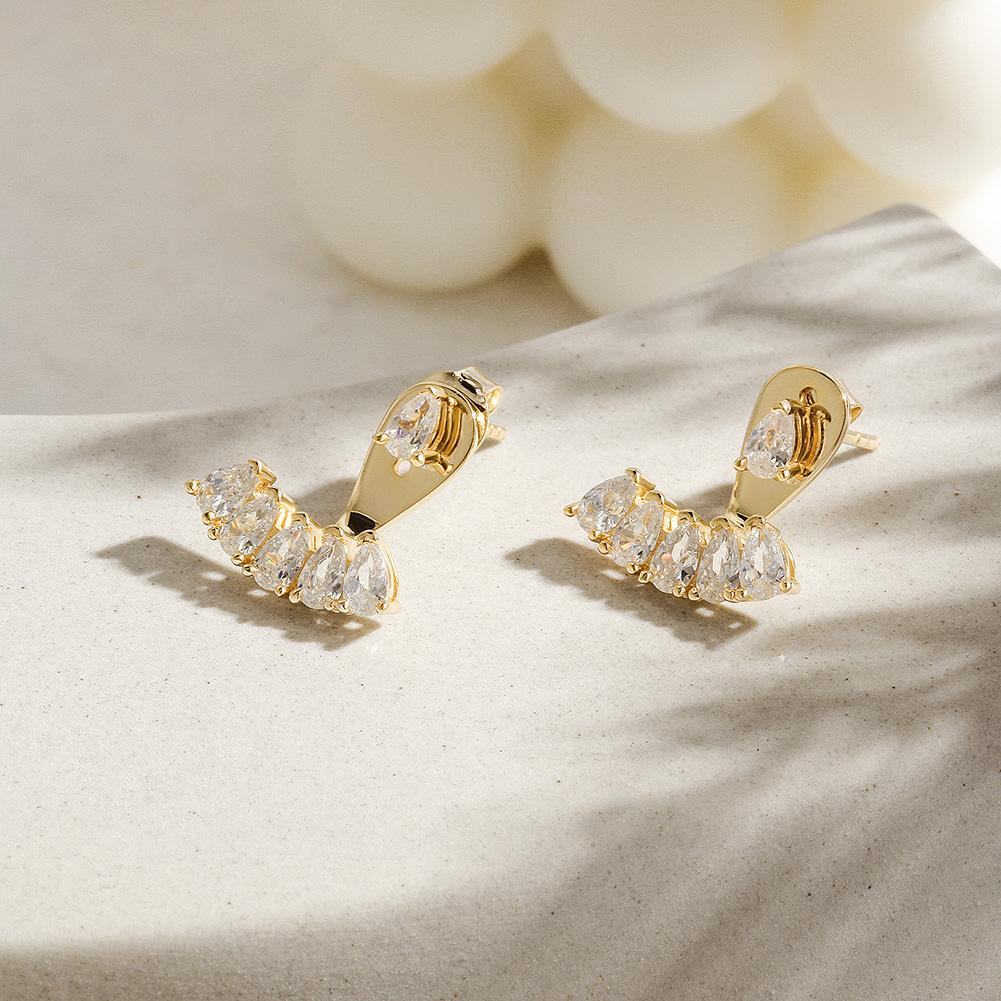 PAVÉ EAR JACKET EARRINGS.