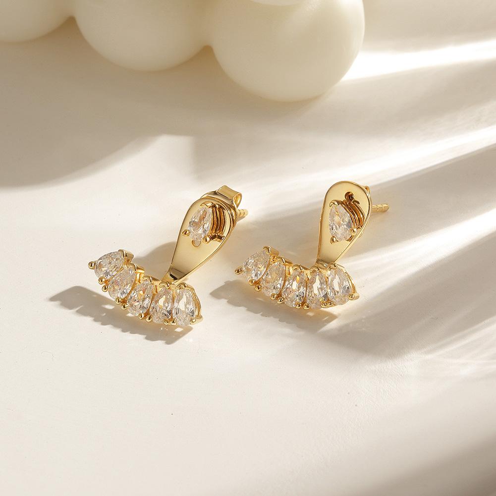PAVÉ EAR JACKET EARRINGS.