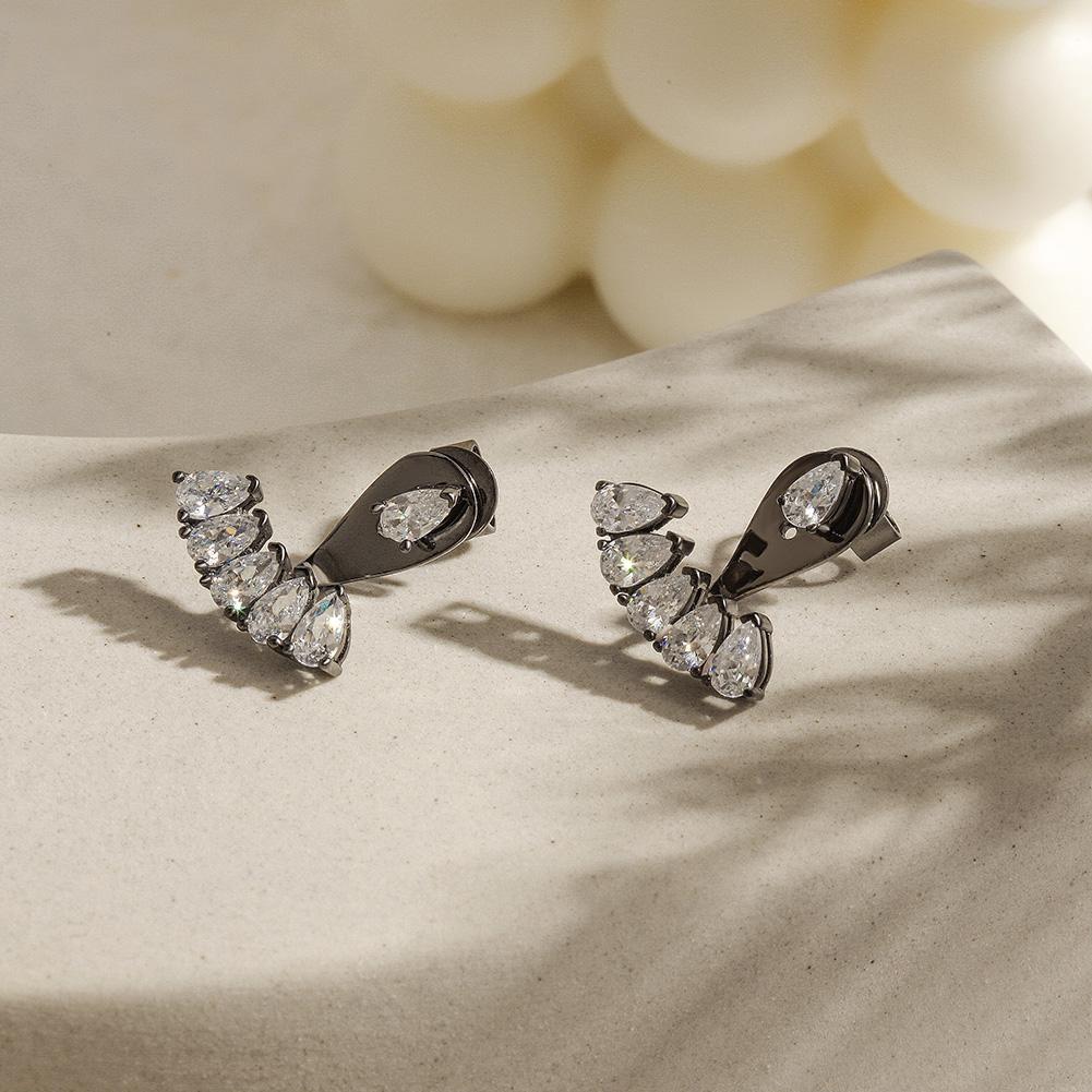 PAVÉ EAR JACKET EARRINGS.