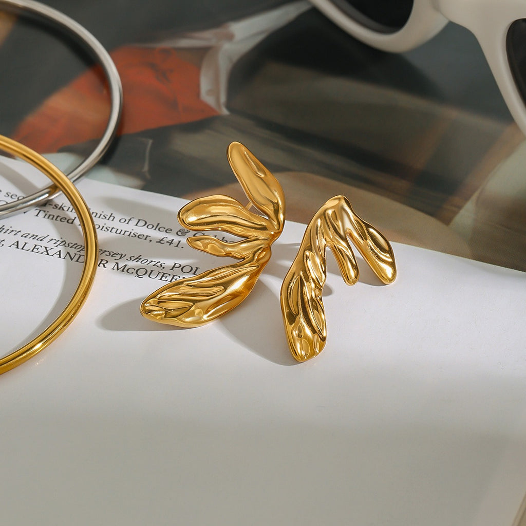 18K gold asymmetric geometric wings earrings in titanium steel — MINIMAL