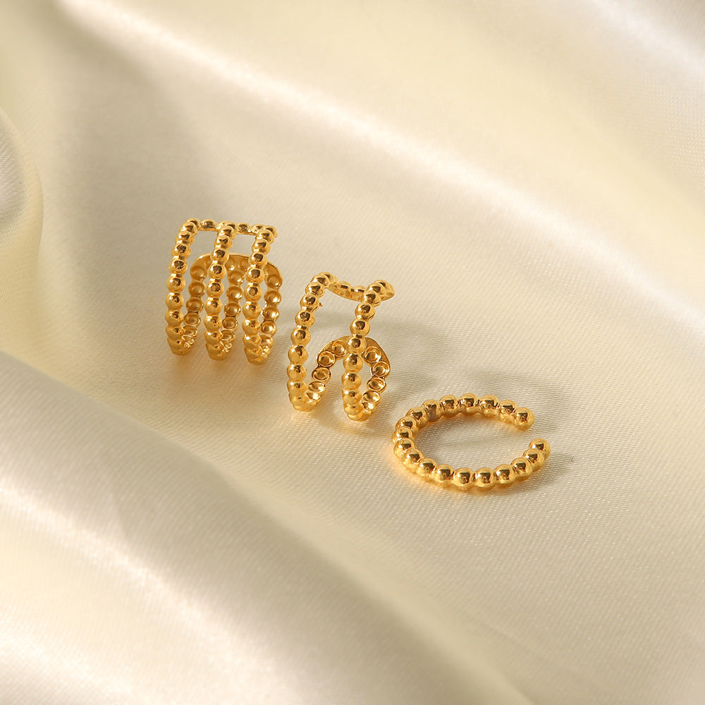  18K gold pearl ear cuff no piercing flat lay, delicate cluster design — MINIMAL