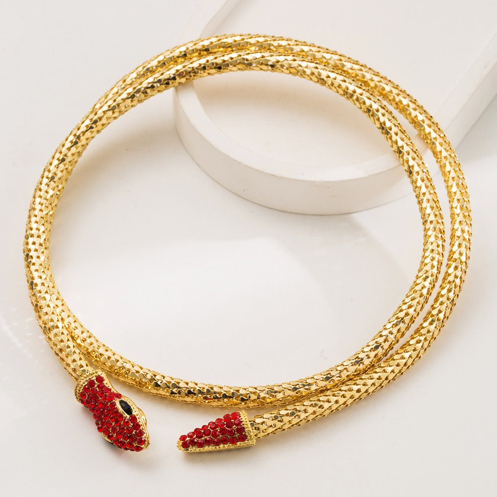 18K gold snake pendant necklace with red gemstone accent — MINIMAL