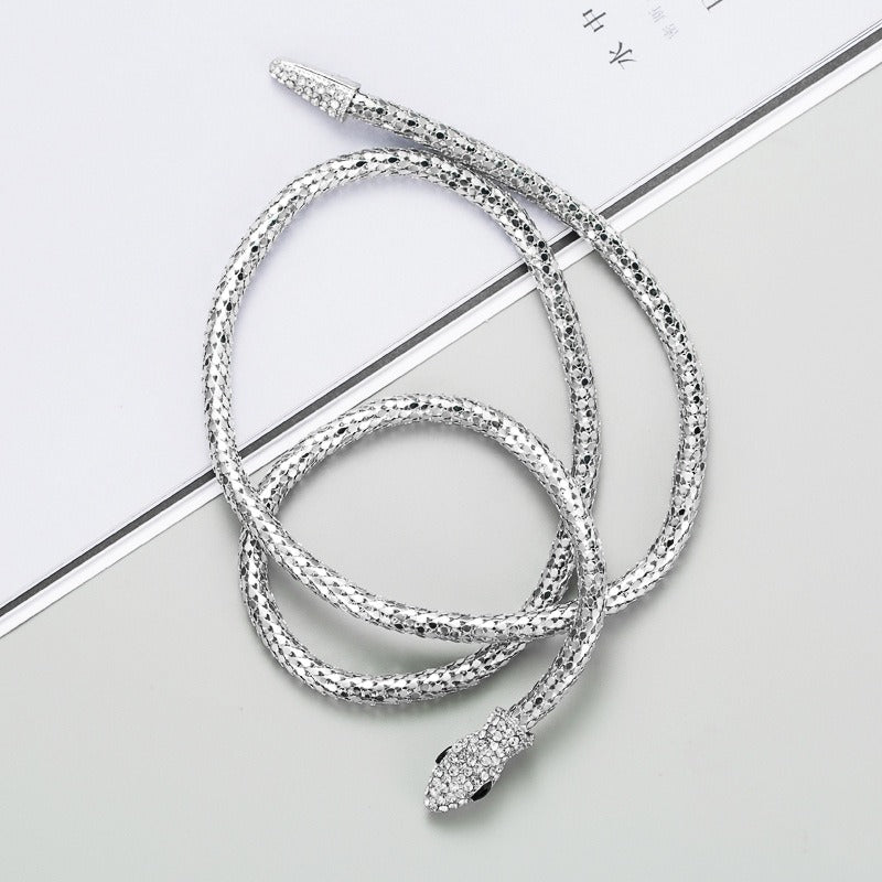 Silver hollow snake pendant necklace with gemstone detail — MINIMAL